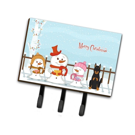 Carolines Treasures Merry Christmas Carolers Beauce Shepherd Dog Leash or Key Holder BB2411TH68